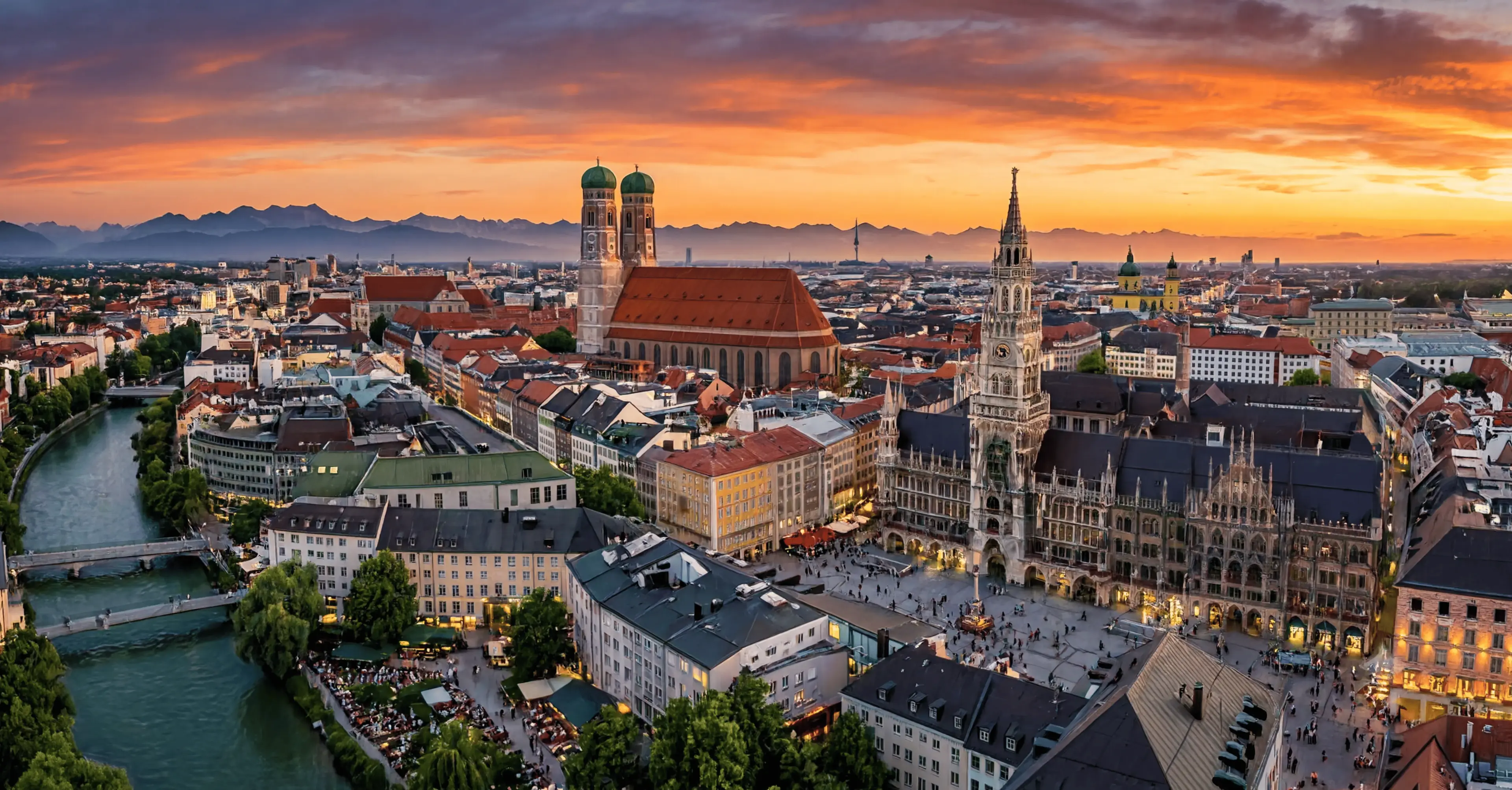 Private transfer from Salzburg Airport to Munich, Bavaria Panoramic Munich old town at sunset with Frauenkirche, Neues Rathaus and the Bavarian Alps on a Salzburg to Munich transfer